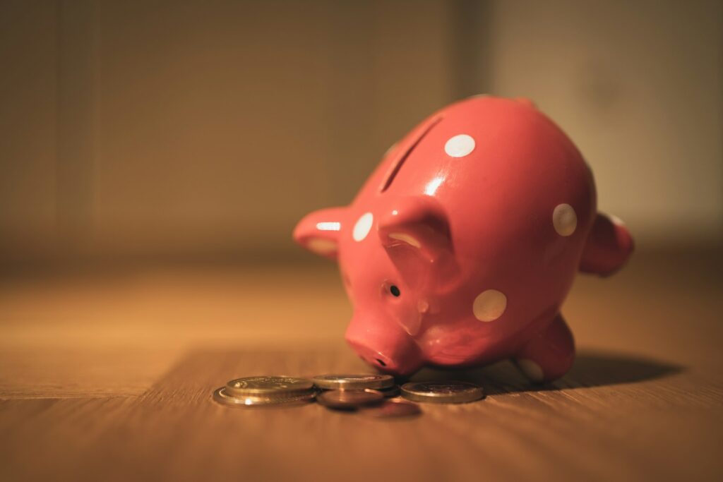 Trump Accounts for Children: What Parents of U.S.-Citizen Kids, Including Families in Japan, Should Know (2026) A pink piggy bank on a wooden table