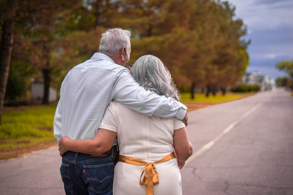 The OBBBA Senior Deduction for People 65+: What It Means for Green-Card Holders Receiving Japanese Pensions An older couple walking arm in arm down a road