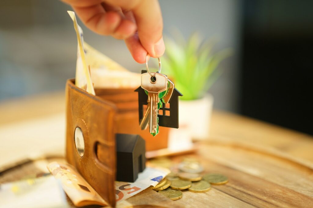 What Is a Nozei Kanrinin? Appointing a Tax Agent in Japan for Your Return, Resident Tax, and Rental Income While Living Abroad (2026) Hand holding house keys with a house-shaped charm